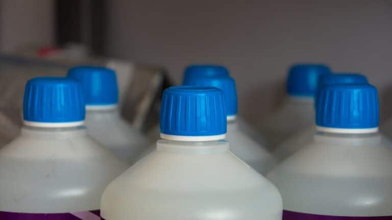 a picture of bleach bottles ready to be recycled