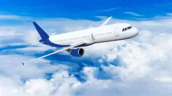 where does airplane waste go featured image - an airplane